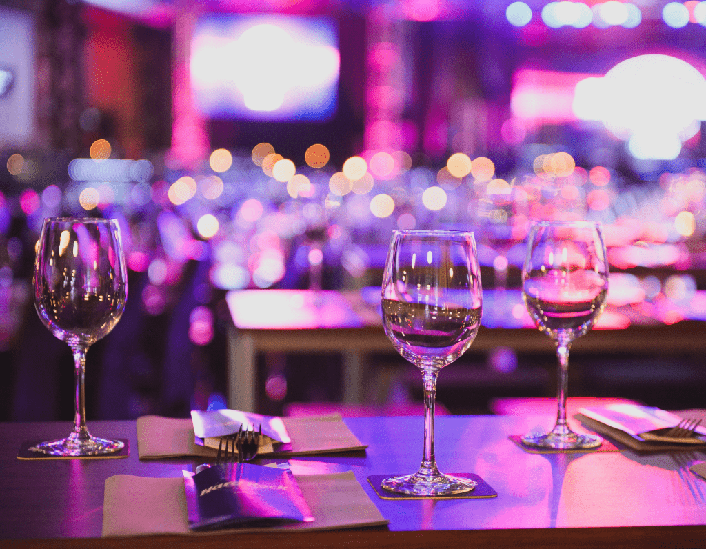three wine glasses on restaurant table